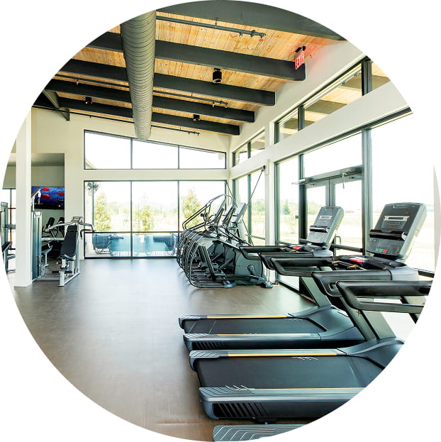 Workout equipment fitness center amenities Creekhaven New Home Community in Iowa Colony, TX