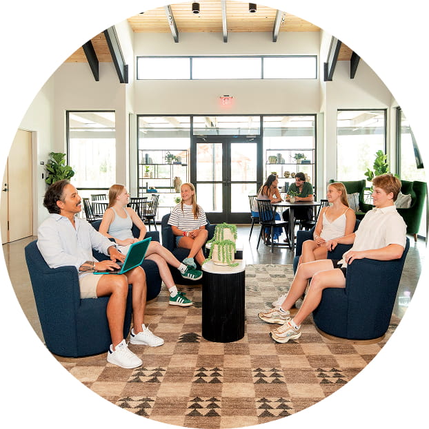 Family in chairs at Amenity Center Creekhaven New Home Community in Iowa Colony, TX